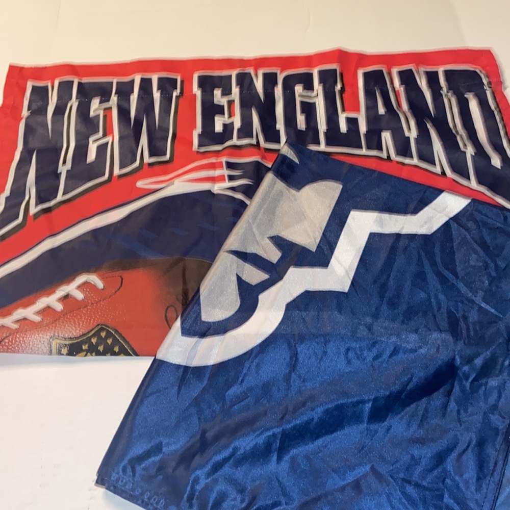 Bundle of two New England Patriots flags.
